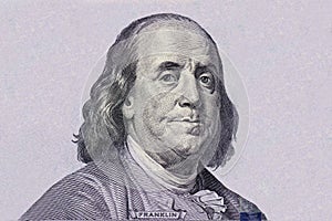 Isolated Portrait of Statesman, inventor, diplomat, and American founding father Benjamin Franklin on 100 US dollar.