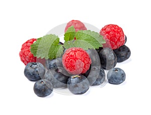 Isolated raspberries and blueberries