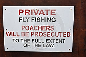 Isolated sign - Private Fly Fishing Poachers will be prosecuted