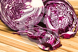 An isolated red cabbage sliced in half