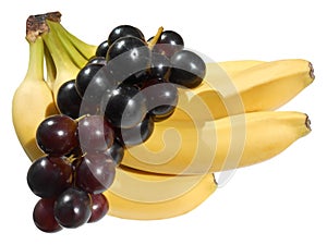 Isolated red grapes and bananas