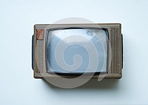 Isolated retro doll house toy TV on white background