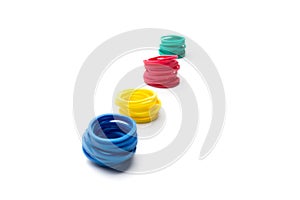 Isolated rubber bands stack on white background