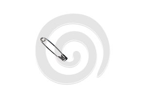 Isolated safety pin placed on a white background with space for text in the right