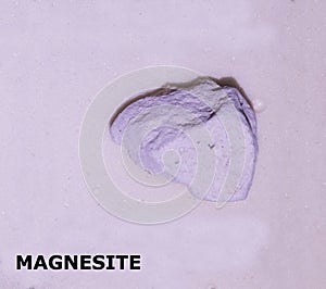 Isolated sample of a Magnesite rock on texture background. Magnesite Sedimentary Rock sample. Magnesite rock isolated