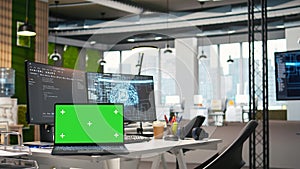 Isolated screen laptop in empty AI startup office