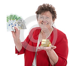 Isolated senior woman with money: concept for pension and heritage.