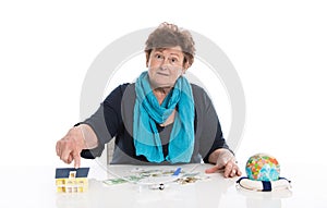 Isolated senior woman think about her money - concept for pension.