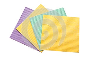 Isolated set od colored washcloths on white