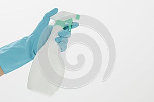 Isolated shot of a hand holding an alcohol spray on a white background - concept COVID19 prevention