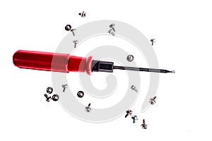 Isolated shot of red handle screwdriver and screws