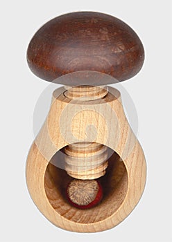 Isolated shot of a wooden mushroom nutcracker on a white background