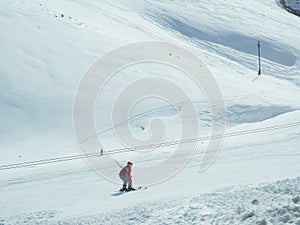 Isolated Skier Skiing On Snow Mountain