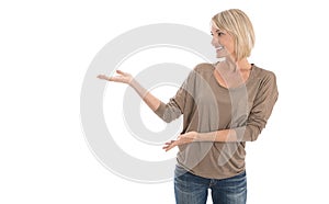 Isolated smiling older or mature woman presenting with hand over