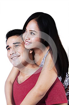 Isolated smiling young couple