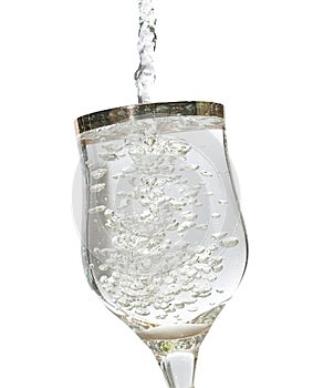 Isolated sparkling water in glass