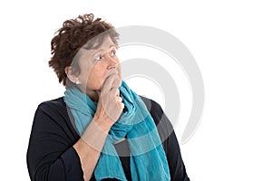 Isolated stunned senior woman looking pensive and sorrowful side