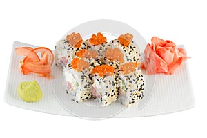 Isolated sushi roll with sasame and salmon roe