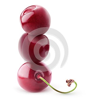 Isolated sweet cherries on top of each other