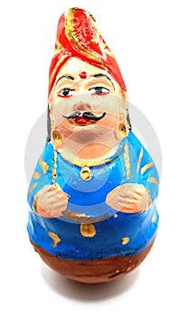 Isolated Tanjore Thalayatti Bommai King made in Clay India