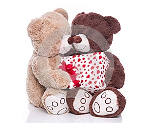 Isolated teddy bears with a gift box for valentine.