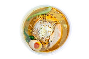 Isolated top view of Ramen Pork Bone Soup Tonkotsu Ramen with Chashu Pork, Scallion, Sprout, Carrot, Menma, Dried Seaweed.