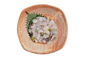 Isolated top view of Tako wasabi is Japanese raw squid mixing with wasabi, shoyu, mirin, sugar, sake and shirodashi.