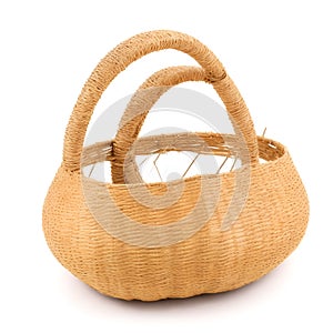 isolated traditional bamboo weaving basket with ears photo