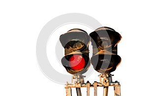 Isolated Traffic light shows red signal on railway