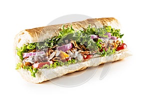 Isolated Turkish kebab baguette with generous portion of vegetables and properly grilled veal or chicken meat