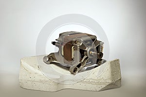Isolated unit of washing machine electric engine and concrete stabilization weight