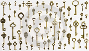 Isolated vintage old golden and bronze key