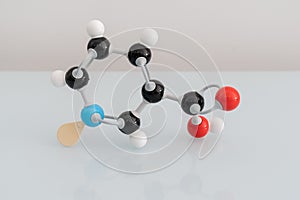 Isolated vitamin B3 made by molecular model with reflection on white background. Niacin chemical formula with colored atoms and bo