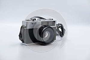 Isolated white background Beautiful vintage analog rangefinder film camera. 70`s Decade film camera. Front right view image