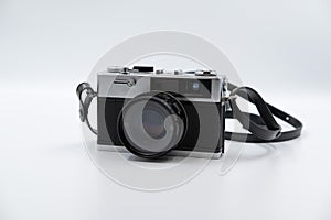 Isolated white background Beautiful vintage analog rangefinder film camera. 70`s Decade film camera. Front view image