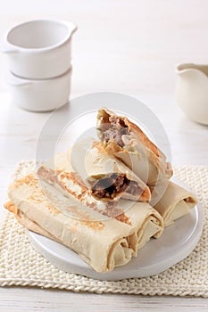 Isolated White Background Frozen Kebab or Shawarma Roll  Close up of Street Food Stall Cooking Fresh Asian kebab. Meat Wrapped