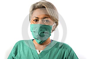 Isolated white background portrait of mature attractive and confident medicine doctor woman or hospital nurse in medical gown and