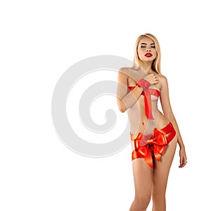 Isolated on white background sexual blonde woman with bows on bo