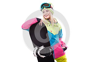 Pretty young blonde woman in colorful snow coat hold snowboard