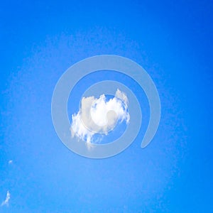 Isolated white clouds on blue sky. Set of isolated clouds over blue background. Design elements. White isolated clouds. Cutout ext