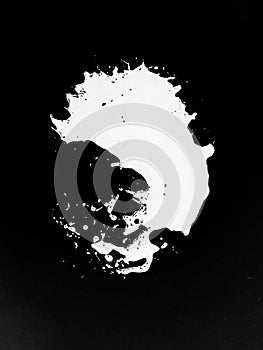 Isolated white colour splash on black background