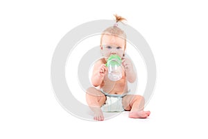 Cute beauty little girl with baby bottle