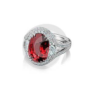 Isolated white gold ring with diamonds and huge red ruby