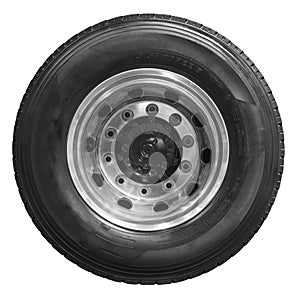 Isolated on white new rear truck wheel on chrome rim with black shine tire. Rear axle mud tire on truck wheel. Car and truck parts