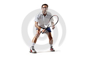 Isolated on white young man is playing tennis