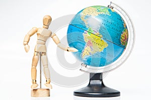 Isolated wooden figure with globe on white background,welcome to