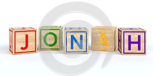 Isolated wooden toy cubes with letters with name jonah