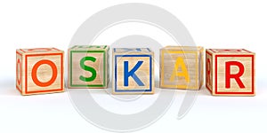 Isolated wooden toy cubes with letters with name oskar