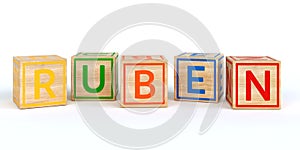 Isolated wooden toy cubes with letters with name ruben