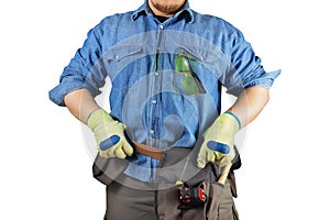 Isolated worker in jeans shirt and tool belt